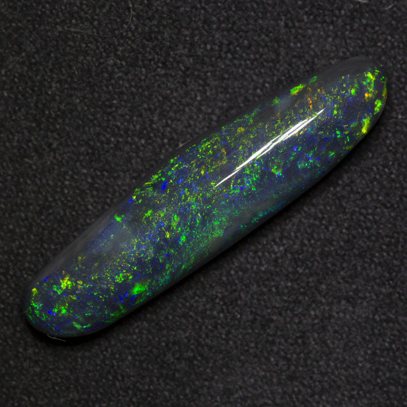 7.01 ct black opal 28x7x5.8mm