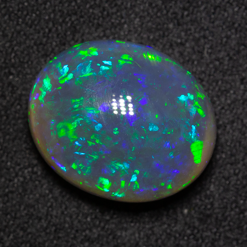 7.06 ct black opal 14x11.5x7.5mm