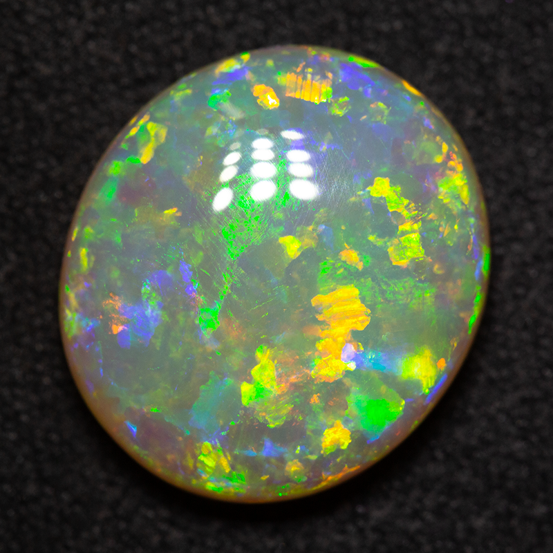 7.11 ct double sided crystal opal 15x13x5mm