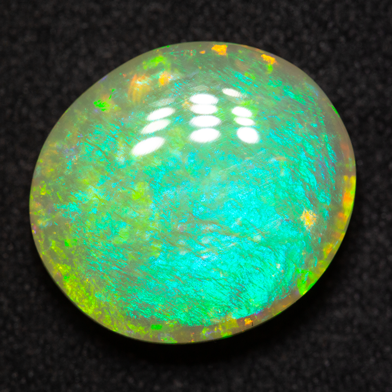 7.11 ct double sided crystal opal 15x13x5mm