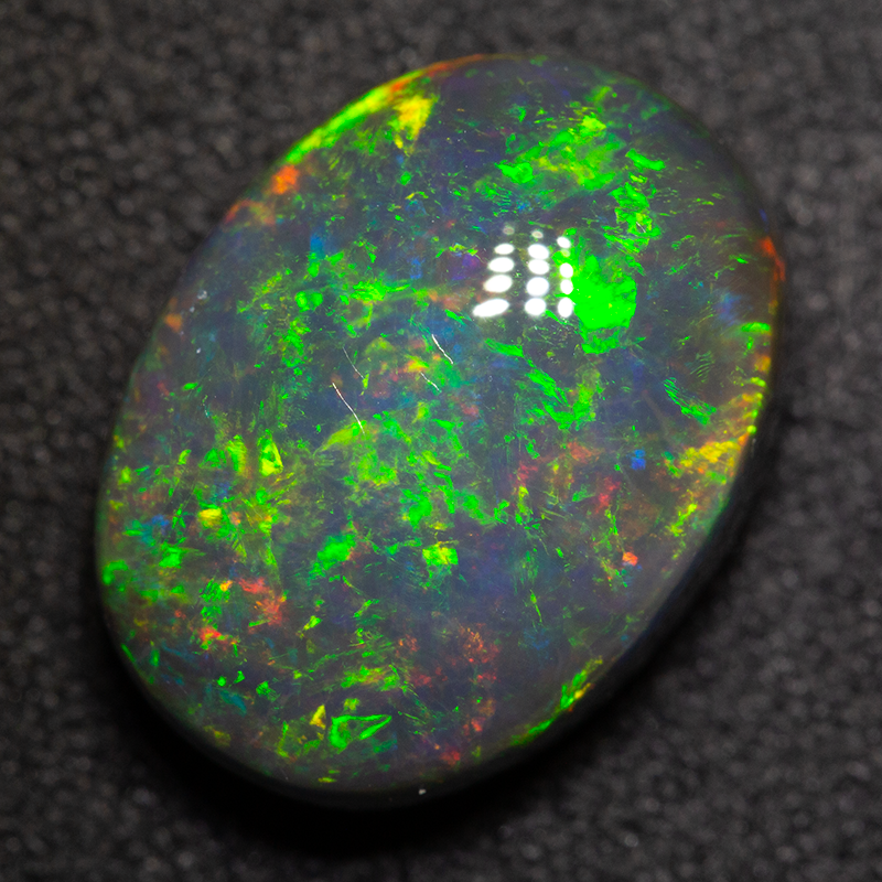 7.29 ct black opal 14.9x11.1x7.1mm