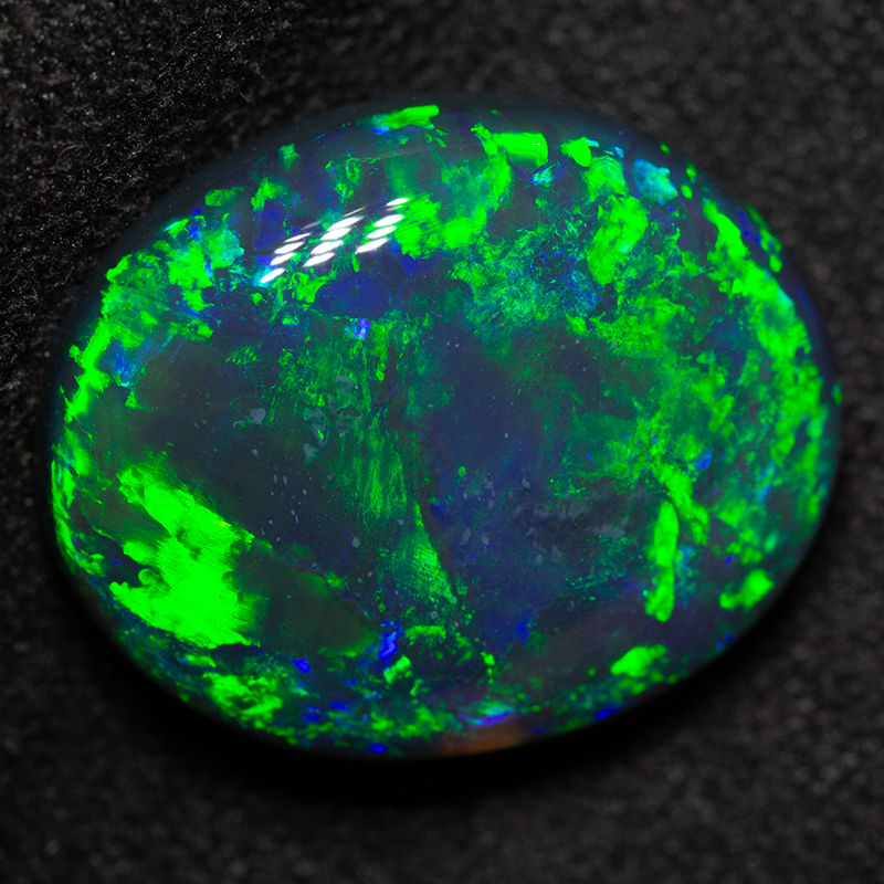 7.35 ct black opal 15.7x12.7x5.6mm