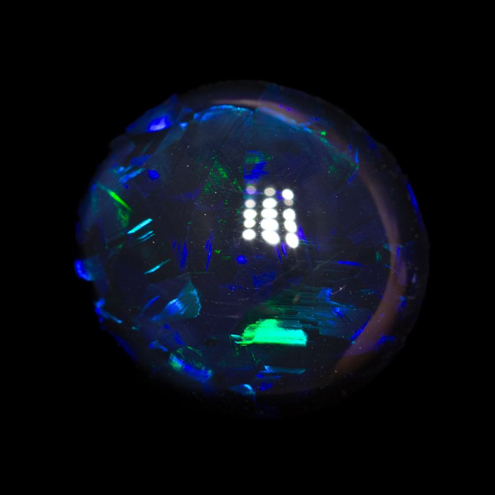 7.42 ct gem black opal 13x12.1x7.9mm