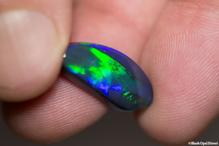 7.49 ct baroque black opal 21x9x6mm