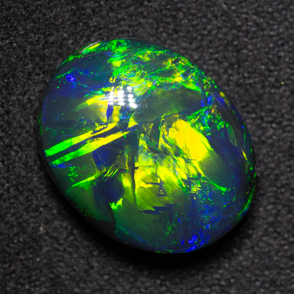 7.55 ct gem black opal 14x11.1x7.4mm