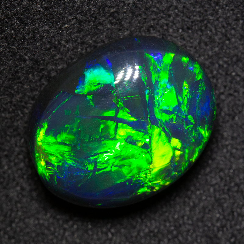 7.55 ct gem black opal 14x11.1x7.4mm