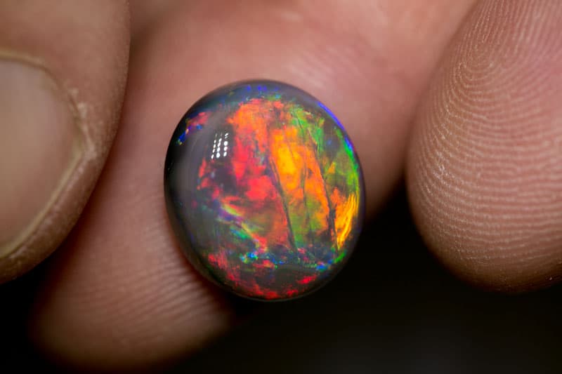 7.55 ct black opal gem 14x12x6.5mm