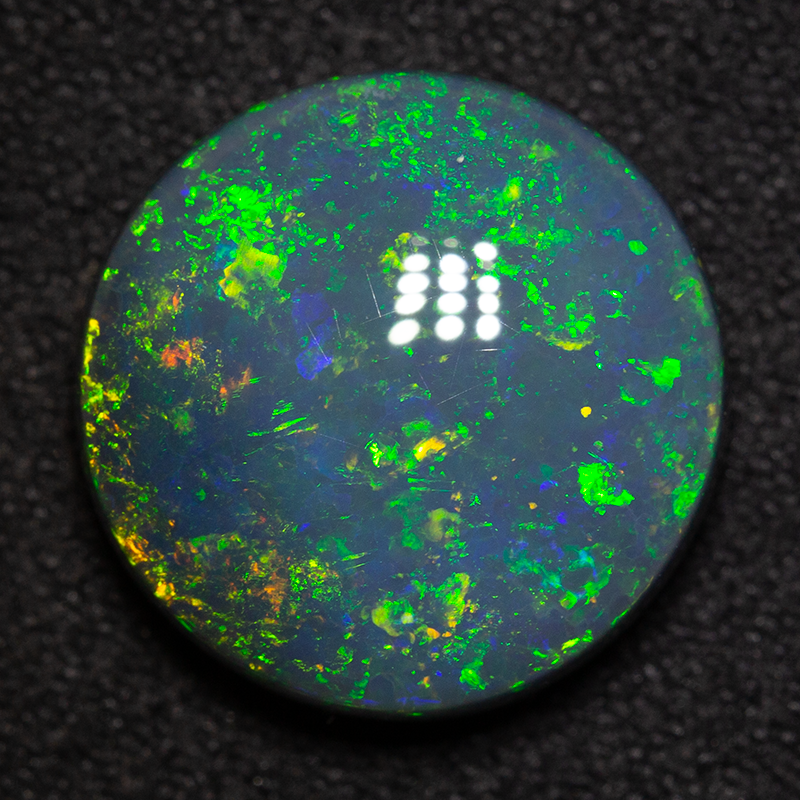 7.60 ct black opal 14x14x5.8mm