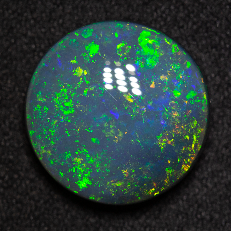7.60 ct black opal 14x14x5.8mm