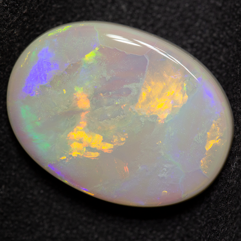 8.39 ct dark opal 18.8x13.9x4.5mm