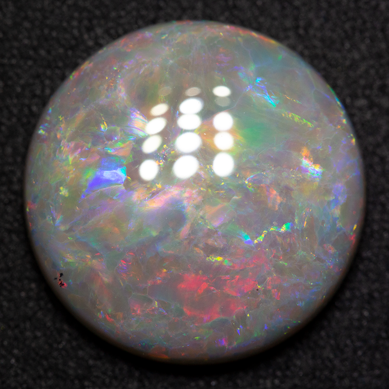 8.57 ct dark opal 16.4x16.3x5mm