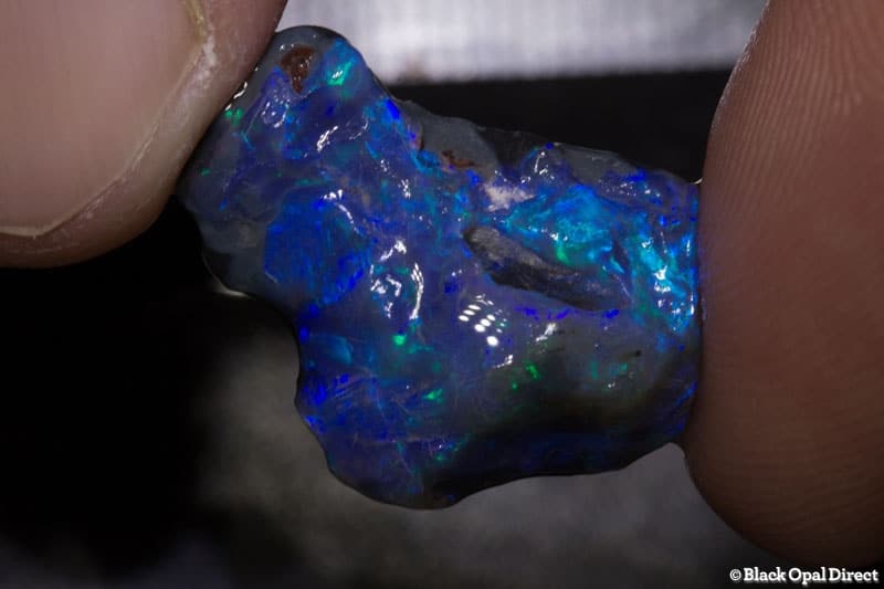 8.68 ct rough opal piece with hole 21mm across