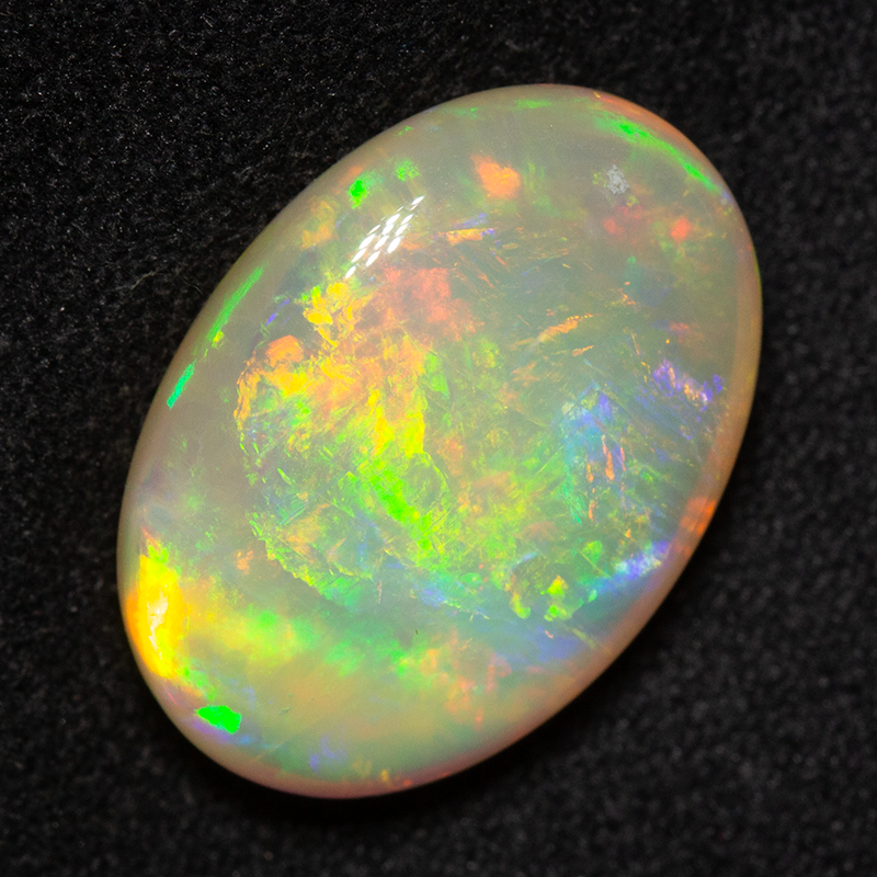 9.17 ct double-sided white opal 17.4x12.4x6.9mm