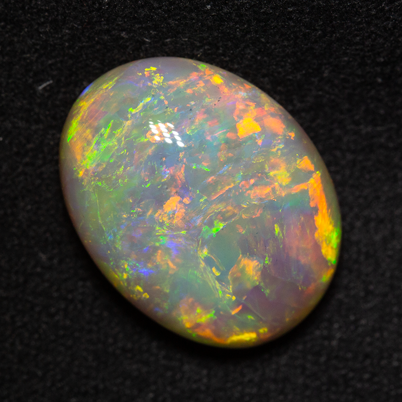 9.51 ct double-sided crystal opal 16.7x12.7x7.7mm