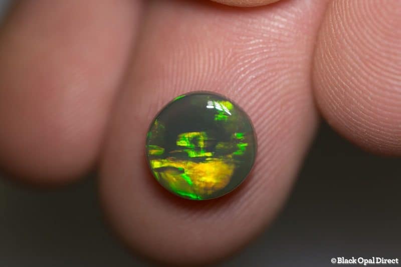 2.48 ct black crystal opal 10mm round x4mm