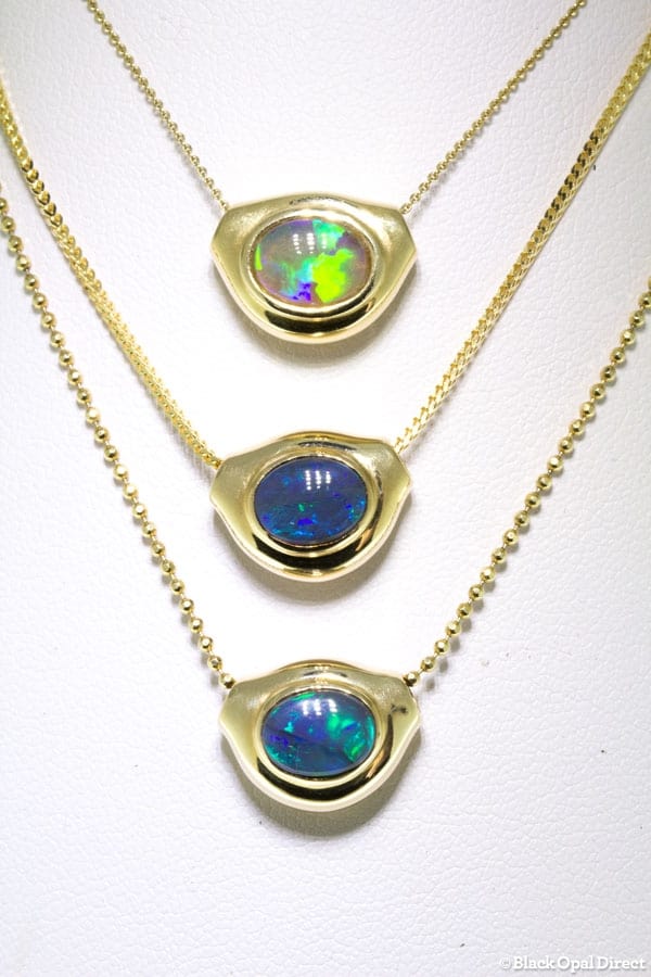 Gold Pod pendant with crystal opal (green)