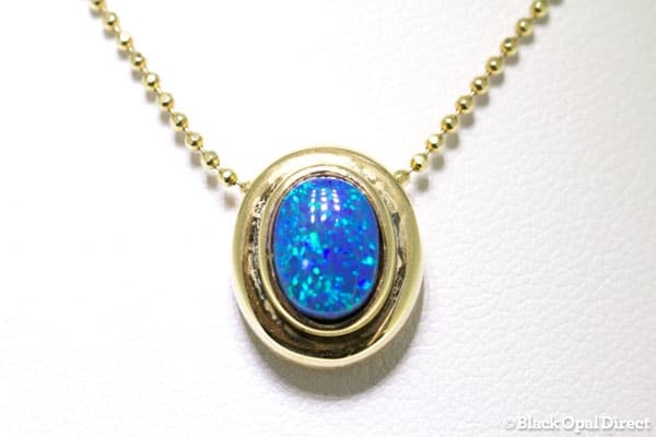Gold Ningaloo pendant with black opal doublet